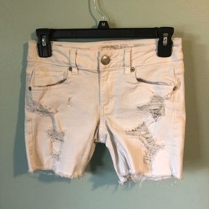 White distressed shorts